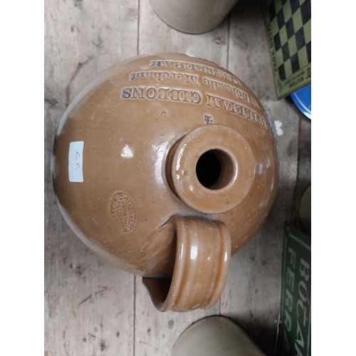 246 - Williams Gibbons Wholesale Merchant Castlebar four gallon stoneware flagon. {47 cm H x 27 cm Dia.}.