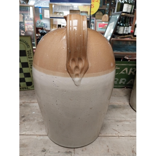 246 - Williams Gibbons Wholesale Merchant Castlebar four gallon stoneware flagon. {47 cm H x 27 cm Dia.}.