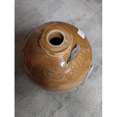 248 - John P Moy Wine and Spirit Merchant Marylebone stoneware flagon with missing handle. {32 cm H x 18 c... 