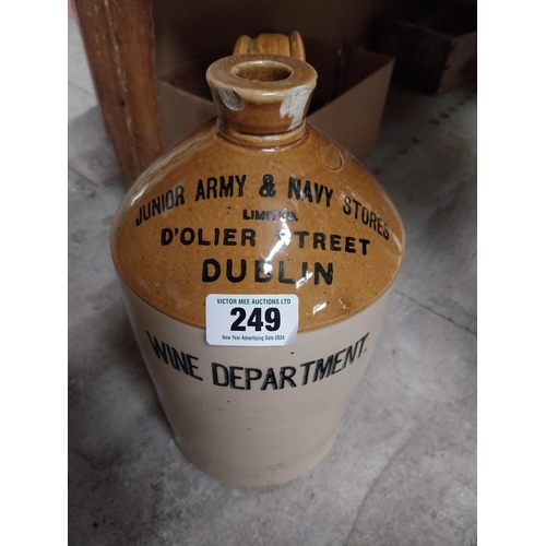 249 - Army and Navy Stores Dublin Wine Dept stoneware flagon. {24 cm H x 18 cm Dia.}.