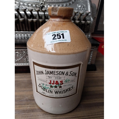 251 - John Jameson Dublin half gallon stoneware whiskey flagon. {26 cm H x 15 cm Dia.}