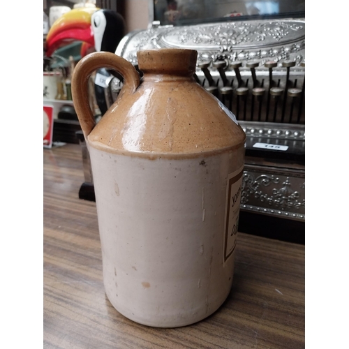 252 - Micheal Egan Limerick six gallon stoneware flagon. {52 cm H x 30 cm Dia.}