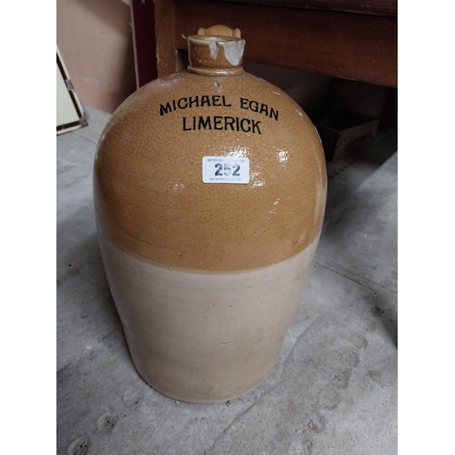 252 - Micheal Egan Limerick six gallon stoneware flagon. {52 cm H x 30 cm Dia.}