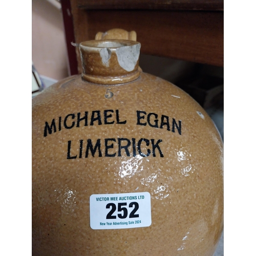 252 - Micheal Egan Limerick six gallon stoneware flagon. {52 cm H x 30 cm Dia.}