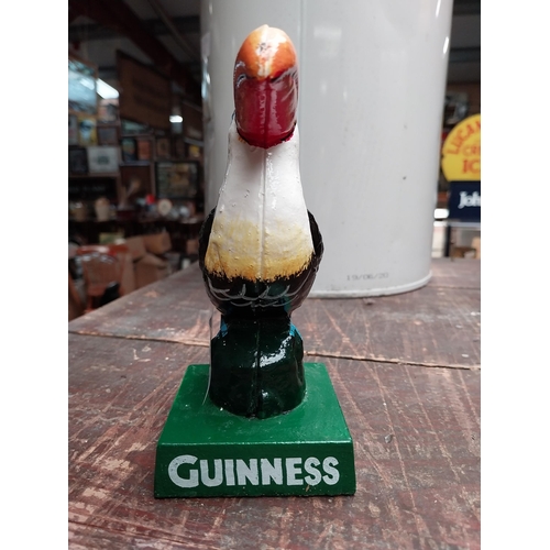 254 - Cast iron Guinness Toucan. {15 cm H x 11 cm W x 7 cm D}.