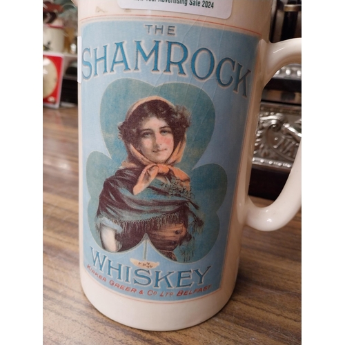 256 - Shamrock Whiskey ceramic advertising water jug. {18 cm H x 16 cm W x 12 cm D}.