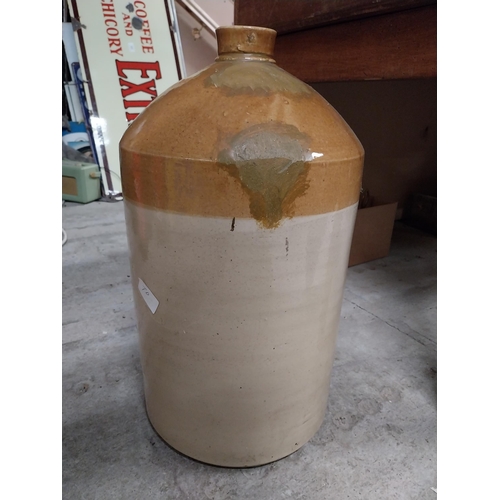 264 - Guinness and Co four gallon stoneware whiskey flagon. {47 cm H x  26 cm Dia.}.