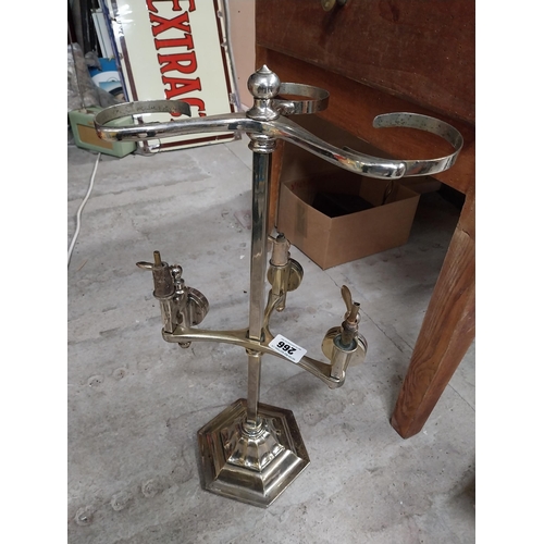 266 - 19th C. brass and chrome three bottle optic stand. {61 cm H x 30 cm Dia.}.