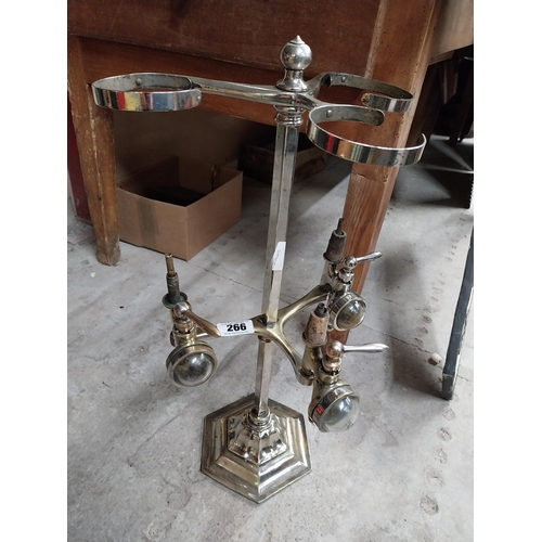 266 - 19th C. brass and chrome three bottle optic stand. {61 cm H x 30 cm Dia.}.