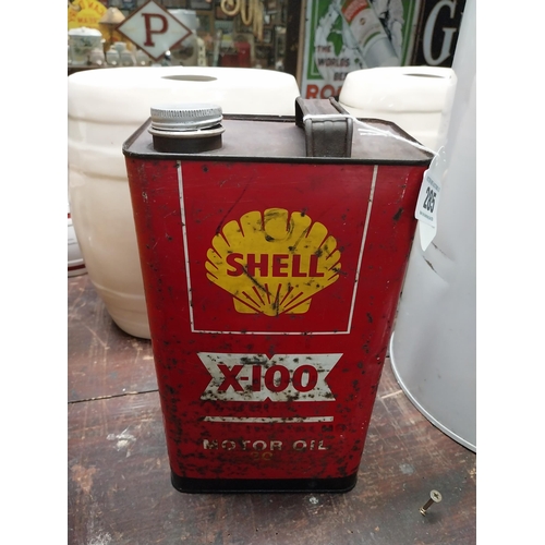 285 - Shell X 100 metal oil can. {21 cm H x 16 cm W x 10 cm D}.