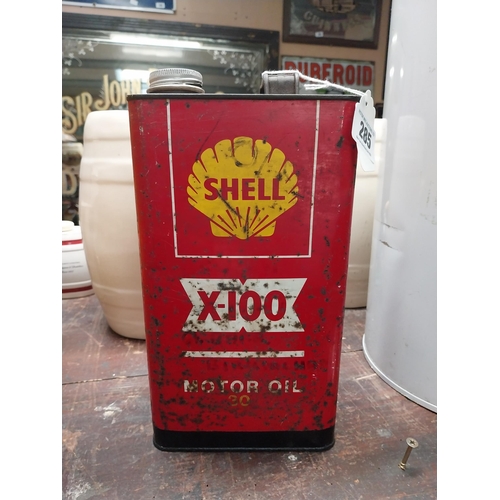 285 - Shell X 100 metal oil can. {21 cm H x 16 cm W x 10 cm D}.