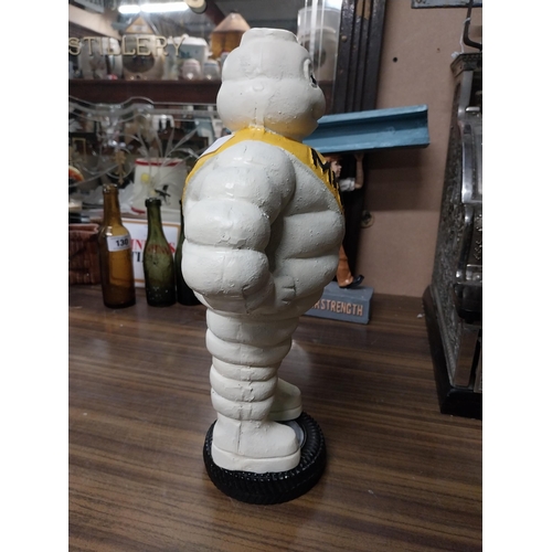 288 - Michelin Man cast iron advertising model. {48 cm H x 23 cm W x 13 cm D}.