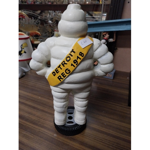 288 - Michelin Man cast iron advertising model. {48 cm H x 23 cm W x 13 cm D}.