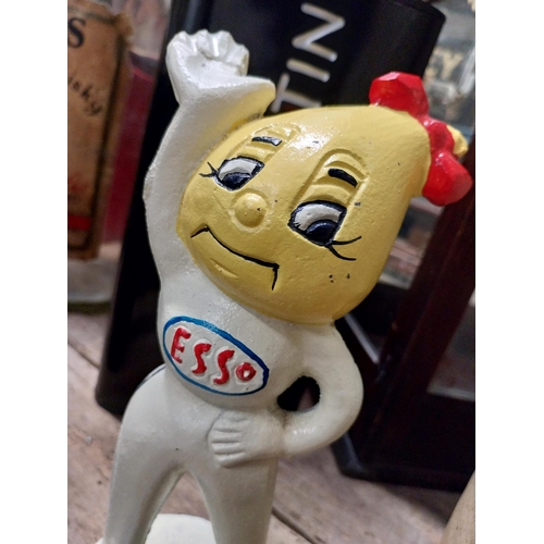 291 - Esso cast iron advertising figure. {24 cm H x 9 cm Dia}.