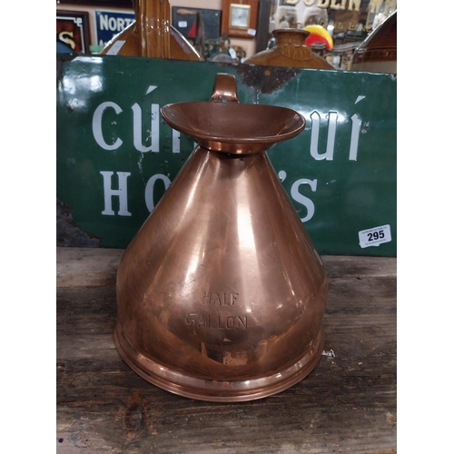 296 - Set  of four graduated copper haystack measures. {28 cm H x 30 cm Dia. to 12 cm H x 13 cm Dia.}