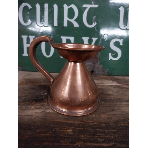 296 - Set  of four graduated copper haystack measures. {28 cm H x 30 cm Dia. to 12 cm H x 13 cm Dia.}