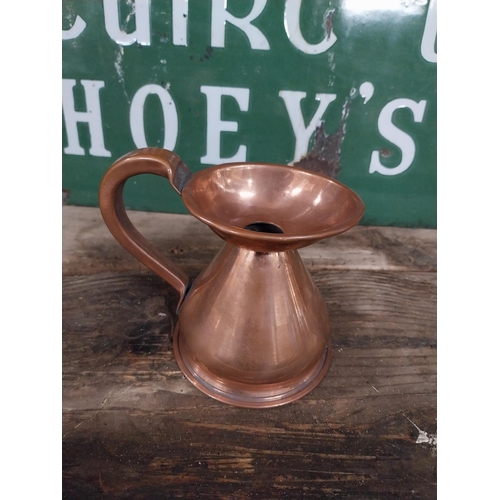 296 - Set  of four graduated copper haystack measures. {28 cm H x 30 cm Dia. to 12 cm H x 13 cm Dia.}