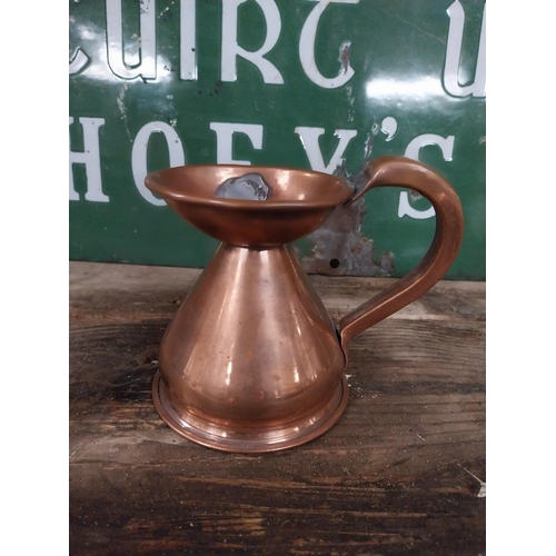 296 - Set  of four graduated copper haystack measures. {28 cm H x 30 cm Dia. to 12 cm H x 13 cm Dia.}