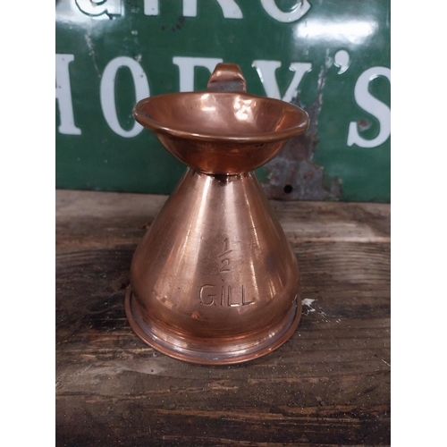 296 - Set  of four graduated copper haystack measures. {28 cm H x 30 cm Dia. to 12 cm H x 13 cm Dia.}