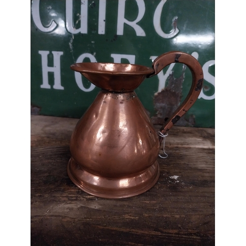 296 - Set  of four graduated copper haystack measures. {28 cm H x 30 cm Dia. to 12 cm H x 13 cm Dia.}