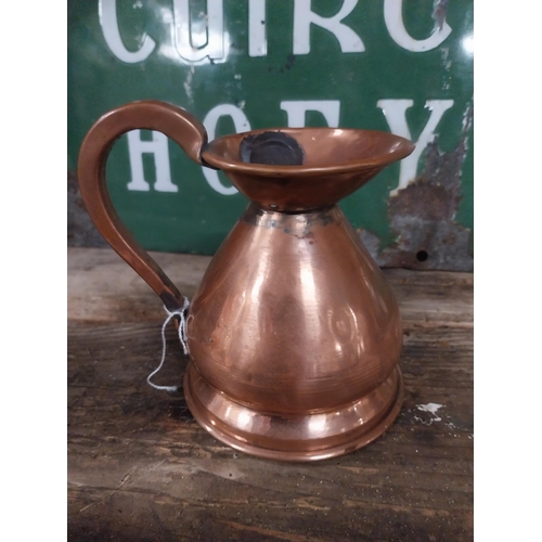 296 - Set  of four graduated copper haystack measures. {28 cm H x 30 cm Dia. to 12 cm H x 13 cm Dia.}