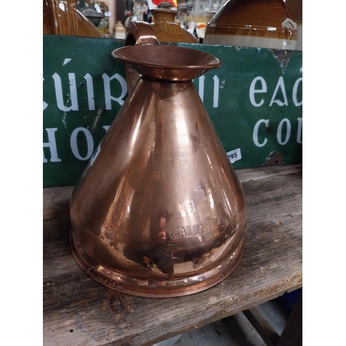 296 - Set  of four graduated copper haystack measures. {28 cm H x 30 cm Dia. to 12 cm H x 13 cm Dia.}