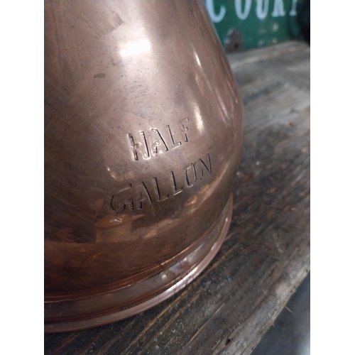 296 - Set  of four graduated copper haystack measures. {28 cm H x 30 cm Dia. to 12 cm H x 13 cm Dia.}