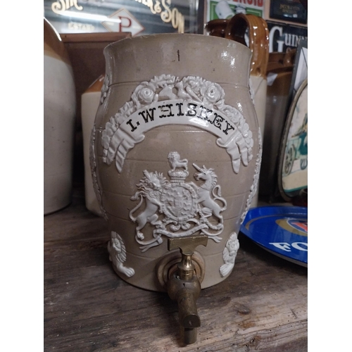 297 - 19th C. Irish whiskey stoneware dispenser with original brass tap. {27 cm H x 22 cm Dia.}