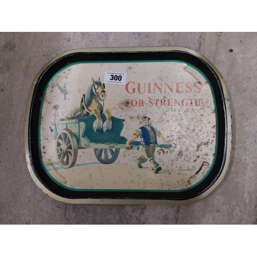 300 - Guinness for Strength tinplate drinks tray. {22 cm H x 42 cm W}.