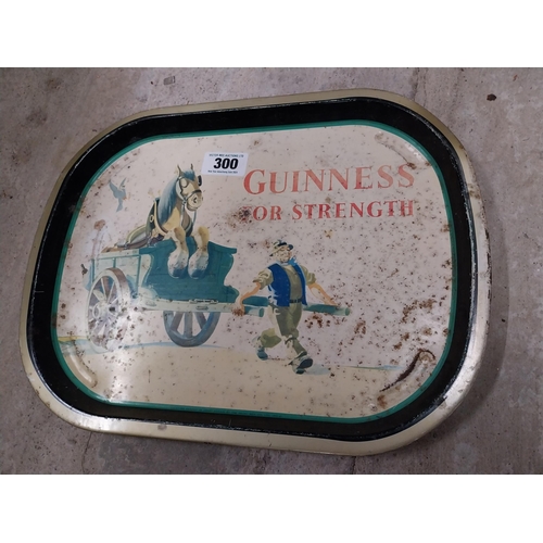 300 - Guinness for Strength tinplate drinks tray. {22 cm H x 42 cm W}.