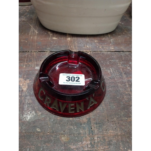 302 - Craven A glass advertising ashtray. {4 cm H x 14 cm Dia.}