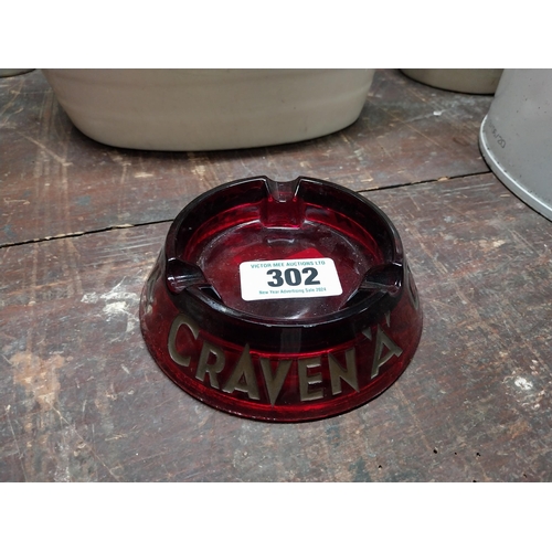 302 - Craven A glass advertising ashtray. {4 cm H x 14 cm Dia.}