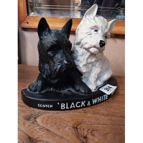 314 - Black and White Whiskey Scottie Dogs Ruberoid advertising figure. {20 cm H x 26 cm W x 8 cm D}.