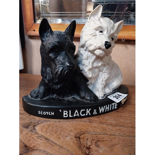 314 - Black and White Whiskey Scottie Dogs Ruberoid advertising figure. {20 cm H x 26 cm W x 8 cm D}.