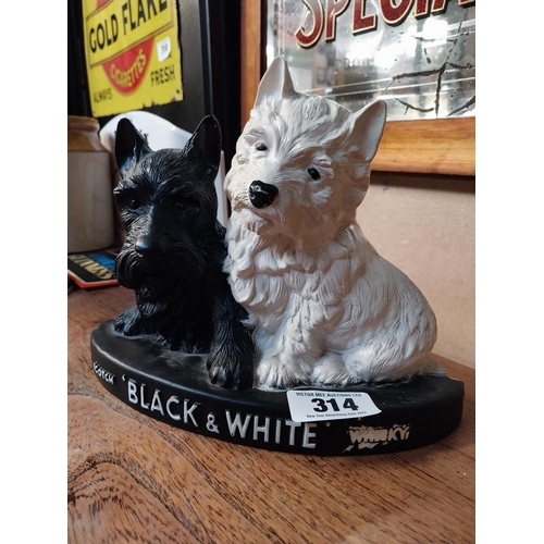 314 - Black and White Whiskey Scottie Dogs Ruberoid advertising figure. {20 cm H x 26 cm W x 8 cm D}.