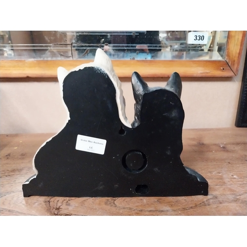 314 - Black and White Whiskey Scottie Dogs Ruberoid advertising figure. {20 cm H x 26 cm W x 8 cm D}.