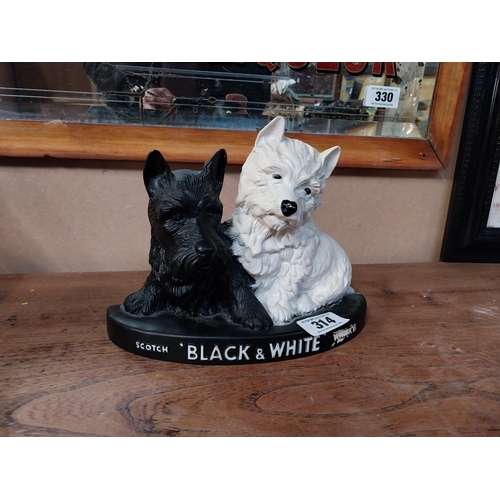 314 - Black and White Whiskey Scottie Dogs Ruberoid advertising figure. {20 cm H x 26 cm W x 8 cm D}.