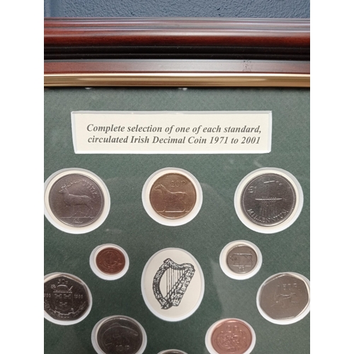 317A - Complete selection of one of each standard circulated Irish decimal coin 1971 to 2001 mounted in mah... 