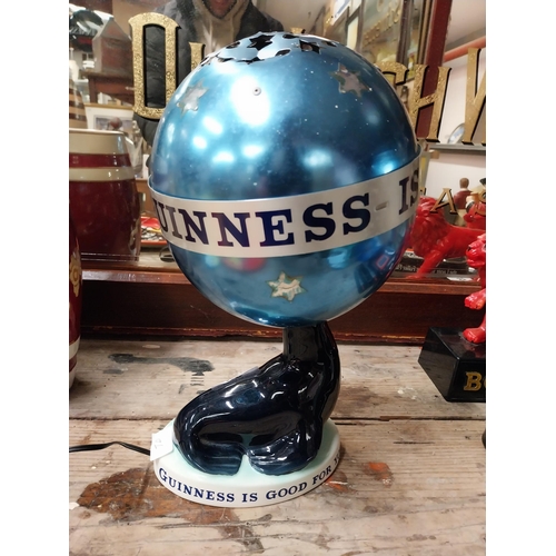 32 - Guinness is Good For You advertising Seal lamp with original shade. {27 cm H x 28 cm W x 11 cm D}.