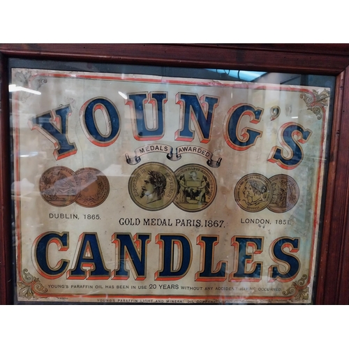 321 - Young's Candles Dublin and London framed advertising showcard. {32 cm H x 62 cm W}.