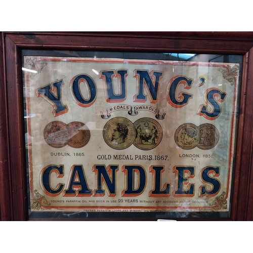 321 - Young's Candles Dublin and London framed advertising showcard. {32 cm H x 62 cm W}.