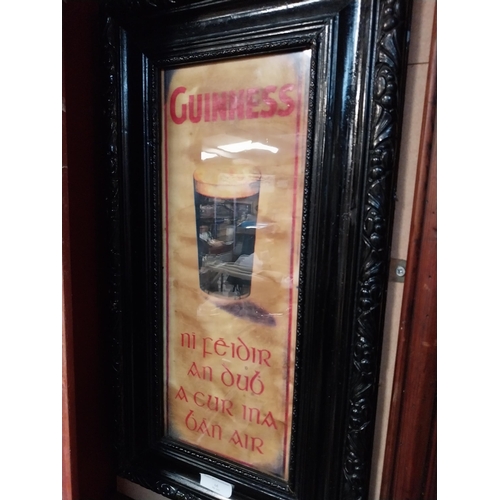 322 - Framed Guinness print as Gaeilge. {54 cm H x 30 cm W}.