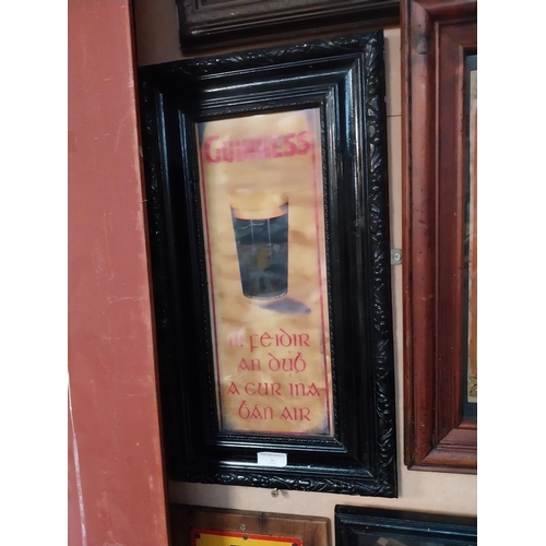 322 - Framed Guinness print as Gaeilge. {54 cm H x 30 cm W}.