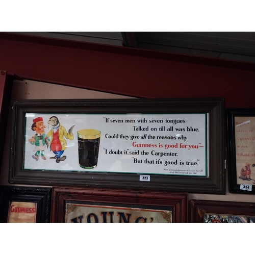 323 - Guinness Seven Men framed advertising print. {33 cm H x 104 cm W}.