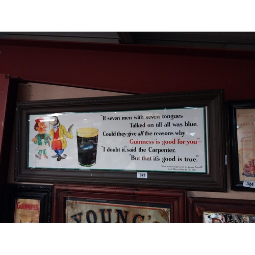 323 - Guinness Seven Men framed advertising print. {33 cm H x 104 cm W}.