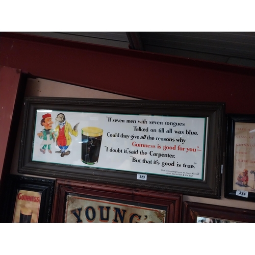 323 - Guinness Seven Men framed advertising print. {33 cm H x 104 cm W}.