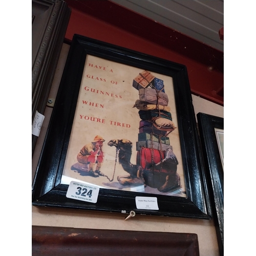 324 - Have a Glass of Guinness when you are tired framed advertising print. {37 cm H x 29 cm W}.