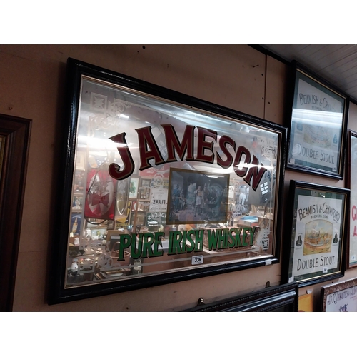 336 - 1970's Jameson Pure Irish Whiskey framed advertising mirror. {57 cm H x 87 cm W}.