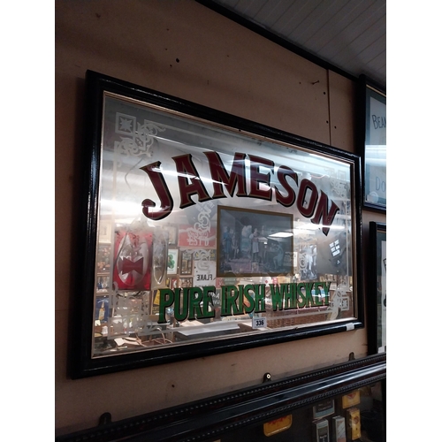 336 - 1970's Jameson Pure Irish Whiskey framed advertising mirror. {57 cm H x 87 cm W}.