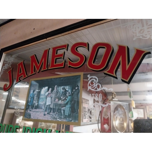 336 - 1970's Jameson Pure Irish Whiskey framed advertising mirror. {57 cm H x 87 cm W}.